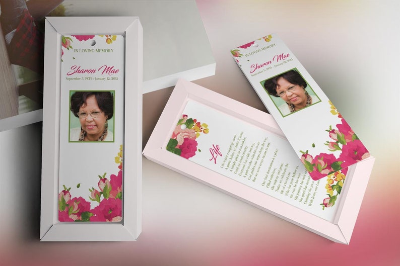 Pink Watercolor Funeral Bookmark Template for Word and Publisher is Size 2.5x7.75 inches. The funeral favor features fuchsia, green, and pink watercolor flowers combined with decorative text. Geared for memorial or funeral services.