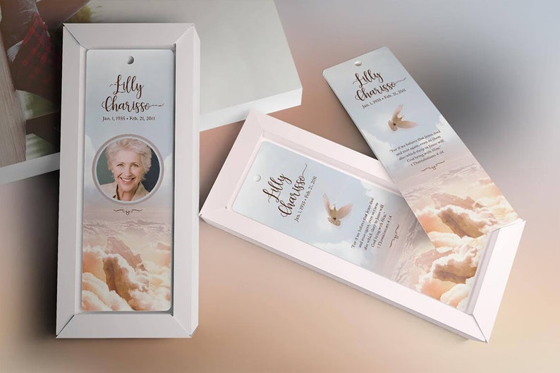 Heaven Memorial Bookmark Template for Word and Publisher is 2.5x7.75 inches. The beige, pink, and blue sunrise background with a praying hand and a dove makes this a great funeral keepsake to remember your loved one. The memory card is designed for