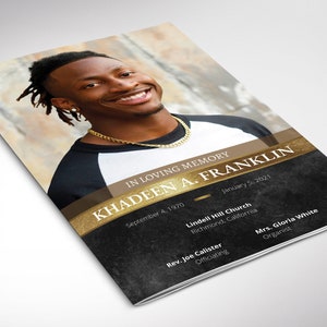 May include: A funeral program booklet featuring a portrait of a smiling person with dreadlocks wearing a gold chain. The text reads IN LOVING MEMORY, KHADEEN A. FRANKLIN, September 4, 1970, January 5, 2021, Lindell Hill Church, Richmond, California, Rev. Joe Calister, and Mrs. Gloria White.