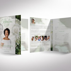 May include: A memorial program with a photo of a woman, white roses, and the text "Celebration of Life." The program is open, revealing additional photos and text. The woman's name is Maria E. Edwards.