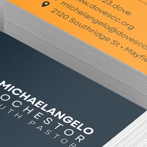 Modern Church Business Card Template for Canva is Size 3.5x2 inches. It features a blue and yellow color scheme. Great for church business cards and pastor business cards. The contrast between the bright and dark colors gives a minimalistic modern