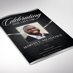 May include: Black and silver funeral program with a photo of a man smiling. The program is titled "Celebrating the Life of Marvin E. Meadows" and includes the dates January 1, 1993 - April 10, 2023. The program also includes the date and location of the funeral service.