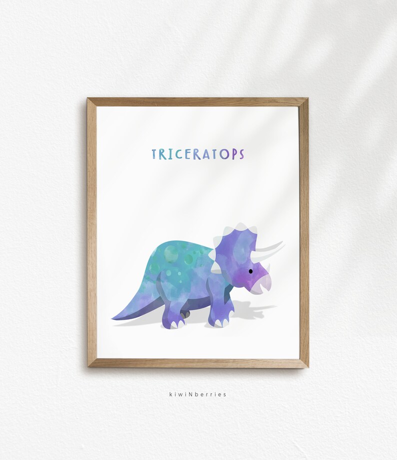 May include: A watercolor illustration of a purple and blue Triceratops dinosaur with white horns and a white background. The text "TRICERATOPS" is above the dinosaur. The text "kiwiNberries" is below the dinosaur.