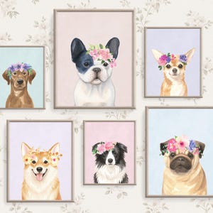 May include: A collection of framed watercolor prints featuring various dog breeds, each adorned with a floral crown. The dogs include a Labrador, French Bulldog, Chihuahua, Corgi, Border Collie, and Pug, set against pastel backgrounds.