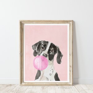 May include: A watercolor illustration of a black and white dog blowing a pink bubble. The dog is looking at the viewer with a playful expression. The background is a light pink color.