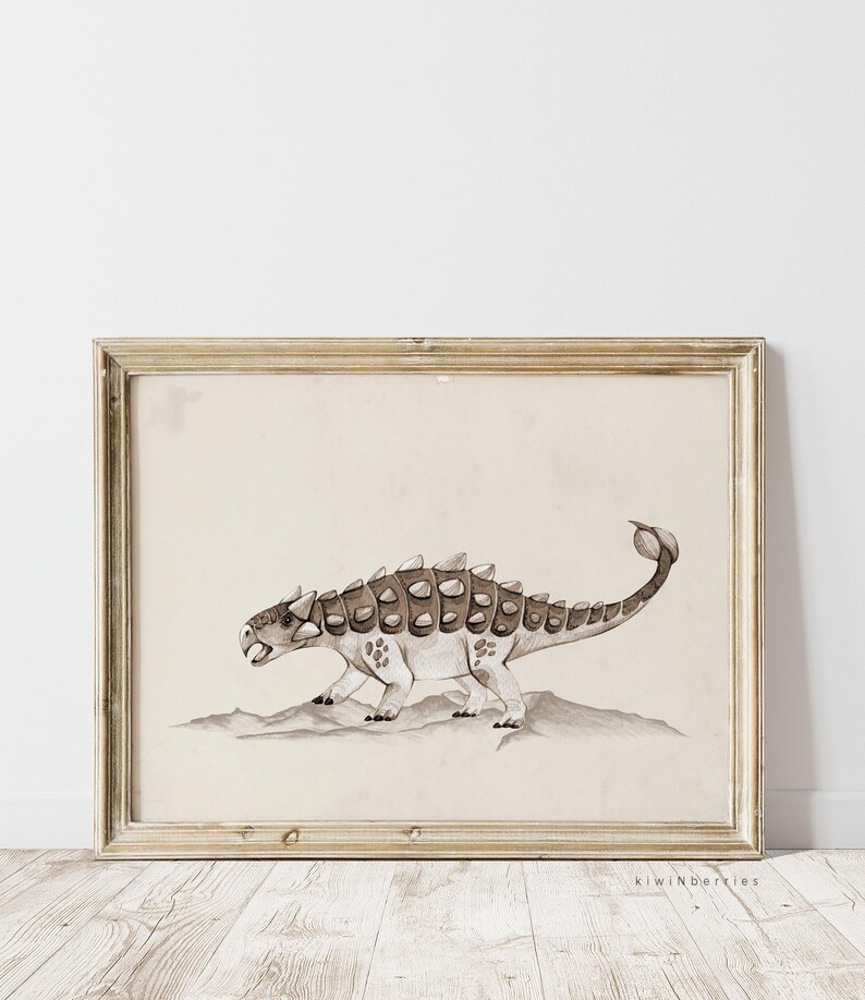 May include: A framed illustration of a brown and white Ankylosaurus dinosaur with a spiky tail, walking on a beige background.