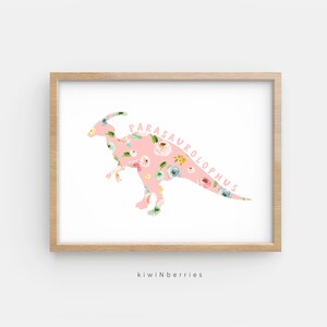 May include: A pink floral print Parasaurolophus dinosaur silhouette on a white background. The dinosaur's name is written in pink letters along the curve of its neck.