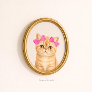 May include: An oval, gold-framed print featuring a cute orange tabby cat wearing pink bows. The cat has large, round eyes and a slightly grumpy expression. The print is set against a white background.