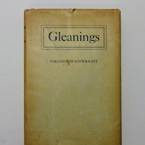 May include: A tan-colored book with the title "Gleanings" and the author's name "VIRGINIA WAINWRIGHT" printed on the front cover.