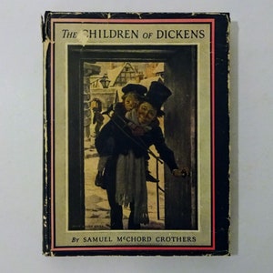 May include: A vintage book cover with a black background and red border. The title is "The Children of Dickens" by Samuel McChord Crothers. The cover features an illustration of a man carrying a child on his back, walking through a snowy doorway.