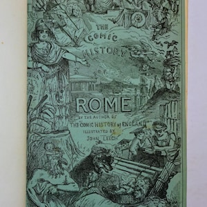 May include: The Comic History of Rome, a book cover illustrated with black and white drawings of people and animals. The title is in large, bold letters and the author and illustrator are listed below. The book cover is a light green color.