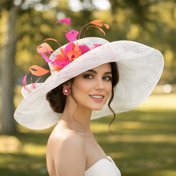 White Summer Straw Hat with a pink floral spray and a gossamer ribbon 12.5\