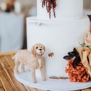 Dog eating wedding cake topper made in Australia, pet cake topper figurine, realistic wedding cake topper with dog biting eating into cake
