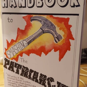 May include: A book cover with a watercolor illustration of a hammer smashing through a red and yellow background. The title of the book is "The Patriarchy" and the text on the cover reads "Patriarchy is the political-social system that insists that males are inherently dominating... and endowed with the right to dominate and rule over the bell hooks".
