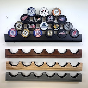 Hockey Puck Display Wall Rack Holder for 6 Pucks Hockey puck holder - displaying up to 21 pucks