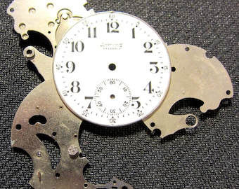 Vintage 1980's London Steampunk watch face with silver movements lapel pin/brooch