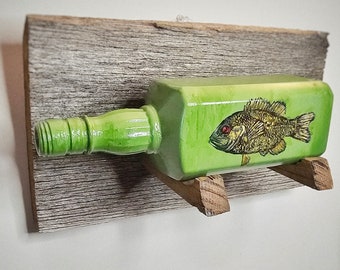 Hand Painted Upcycle Bottle Rock Bass from Local Creek Clean Ups