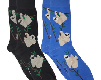 May include: A pair of socks with a sloth design. One sock is black with green leaves and white sloths. The other sock is blue with green leaves and white sloths. The socks have the text "Foozy's" on the bottom.