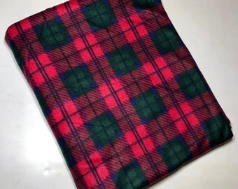 May include: Red, green, and blue plaid fabric with a soft, fuzzy texture.