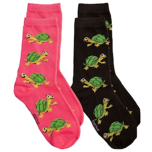 May include: A pair of socks with a turtle pattern. One sock is pink with green turtles and the other is black with green turtles.