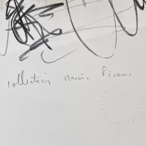 May include: A white paper with a pencil sketch of abstract lines and shapes. The words "collection naive" are handwritten in pencil. The name "Picasso" is also visible. A circular stamp reads "After E Work by Pablo Picasso A Limited Edition."