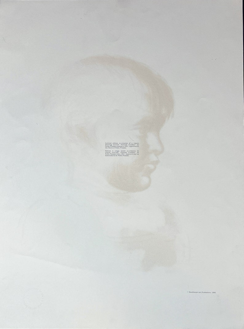 May include: A soft, sepia-toned print of a person's profile, likely a portrait. The image is faded, with the subject's features subtly defined against a white background. Text is visible on the right side of the image.