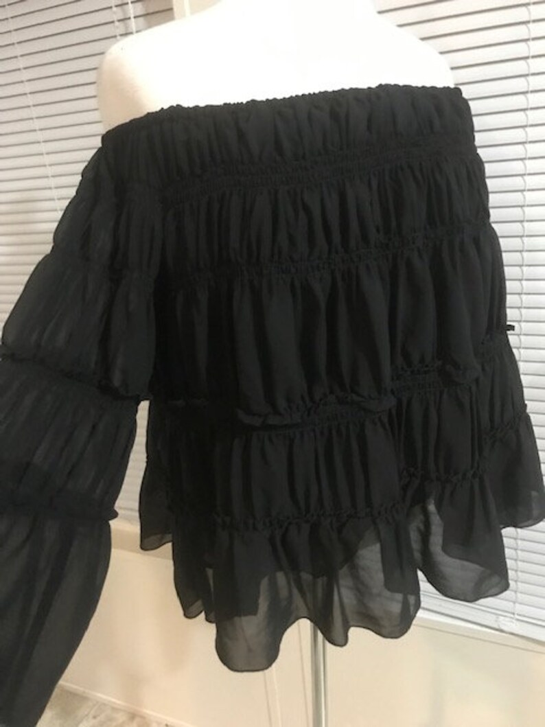 sheer black off the shoulder blouse