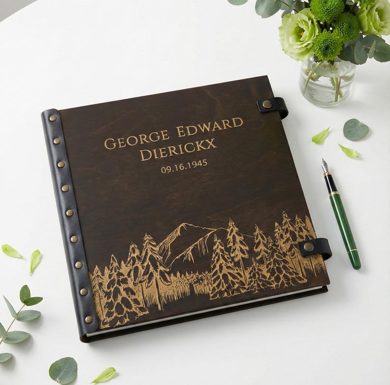 Custom engraved wooden memory Photo album designed as a family legacy album. The dark brown wood cover features a rustic pine tree design and personalized text, making it a meaningful keepsake for family history and old photos.