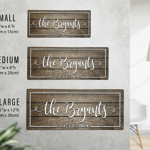 Wood sign size comparison chart listing dimensions: Small 13x6 inches, Medium 20x8 inches, and X-Large 23.5x12 inches.