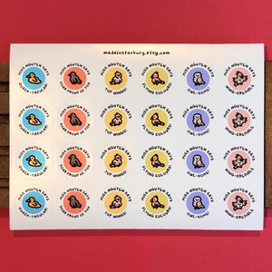 May include: A white sticker sheet featuring four rows of six circular stickers. Each sticker displays a cartoon bird with text including Miss Nguyen Says and puns like Quack-tacular, Soar Proud of You, Top Wings, Flying Colours, Owl-some, and Wing-credible.