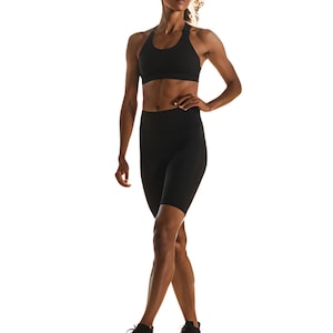 The clothing is form-fitting and made of a stretchy, comfortable material.  Suitable for athletic activities and fitness apparel.