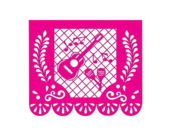 May include: A pink paper cutout of a guitar, maracas, and musical notes. The design is framed by a decorative border with floral and scrollwork details. This is a traditional Mexican paper craft known as "papel picado".
