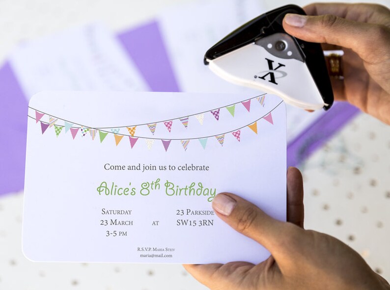 May include: A white invitation card with a colorful bunting design at the top. The text on the card reads "Come and join us to celebrate Alice's 8th Birthday. Saturday 23 March 3-5 PM AT 23 Parkside SW15 3RN RSVP. MARIA STEV maria@mail.com".