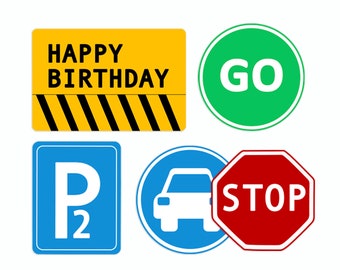 May include: Five different traffic signs with various messages. A yellow and black sign reads "HAPPY BIRTHDAY". A green circle sign reads "GO". A blue square sign reads "P2". A blue circle sign with a white car inside reads "GO". A red octagon sign reads "STOP".