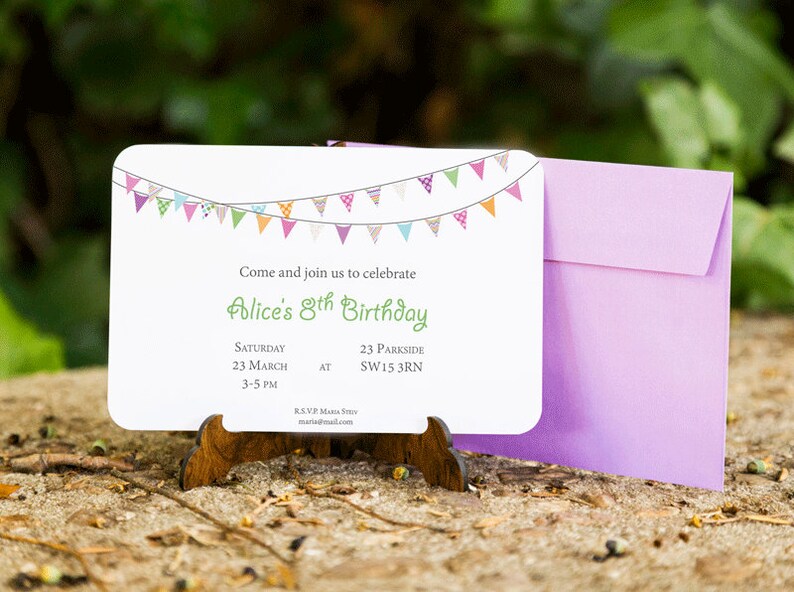 May include: A white invitation card with a colorful bunting design at the top. The text reads "Come and join us to celebrate Alice's 8th Birthday. Saturday 23 March 3-5 PM AT 23 Parkside SW15 3RN. RSVP Maria Smith maria@mail.com"