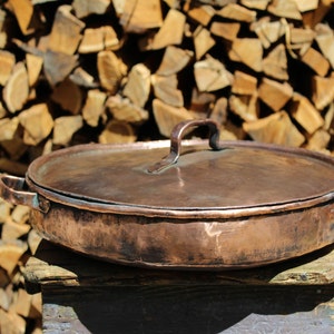 Grande poêle pour risotto ou paella, allant au four, ronde en cuivre étamé, fabriquée à la main.