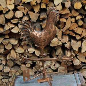 Hand made copper rooster wind vane with cardinal points
