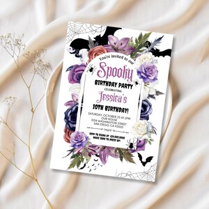 May include: A purple and white floral design with bats and spiderwebs on a white background. The text reads "You're invited to our Spooky Birthday Party Celebrating Jessica's 10th Birthday! Saturday October 25 at 2PM Our House 5154 Washington Street San Diego, CA 92020"