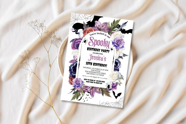 May include: A purple and white floral design with bats and spiderwebs on a white background. The text reads "You're invited to our Spooky Birthday Party Celebrating Jessica's 10th Birthday! Saturday October 25 at 2PM Our House 5154 Washington Street San Diego, CA 92020"
