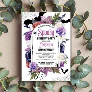 May include: Purple, white, and pink floral birthday party invitation with a spooky theme. The invitation features bats, spiders, and a spiderweb. The text reads "You're invited to our Spooky Birthday Party Celebrating Jessica's 10th Birthday!"