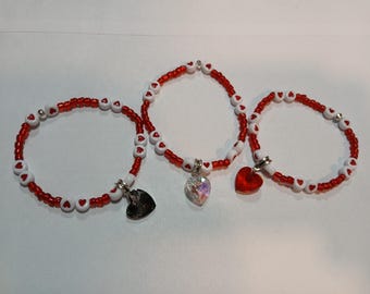 Love friendship bracelet with heart charm