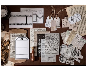 May include: A collection of vintage-style paper ephemera, including blank tags, patterned paper, and stickers. The ephemera features a variety of designs, including a butterfly, a Christmas tree, and a North Pole. The ephemera is perfect for scrapbooking, journaling, and other craft projects.