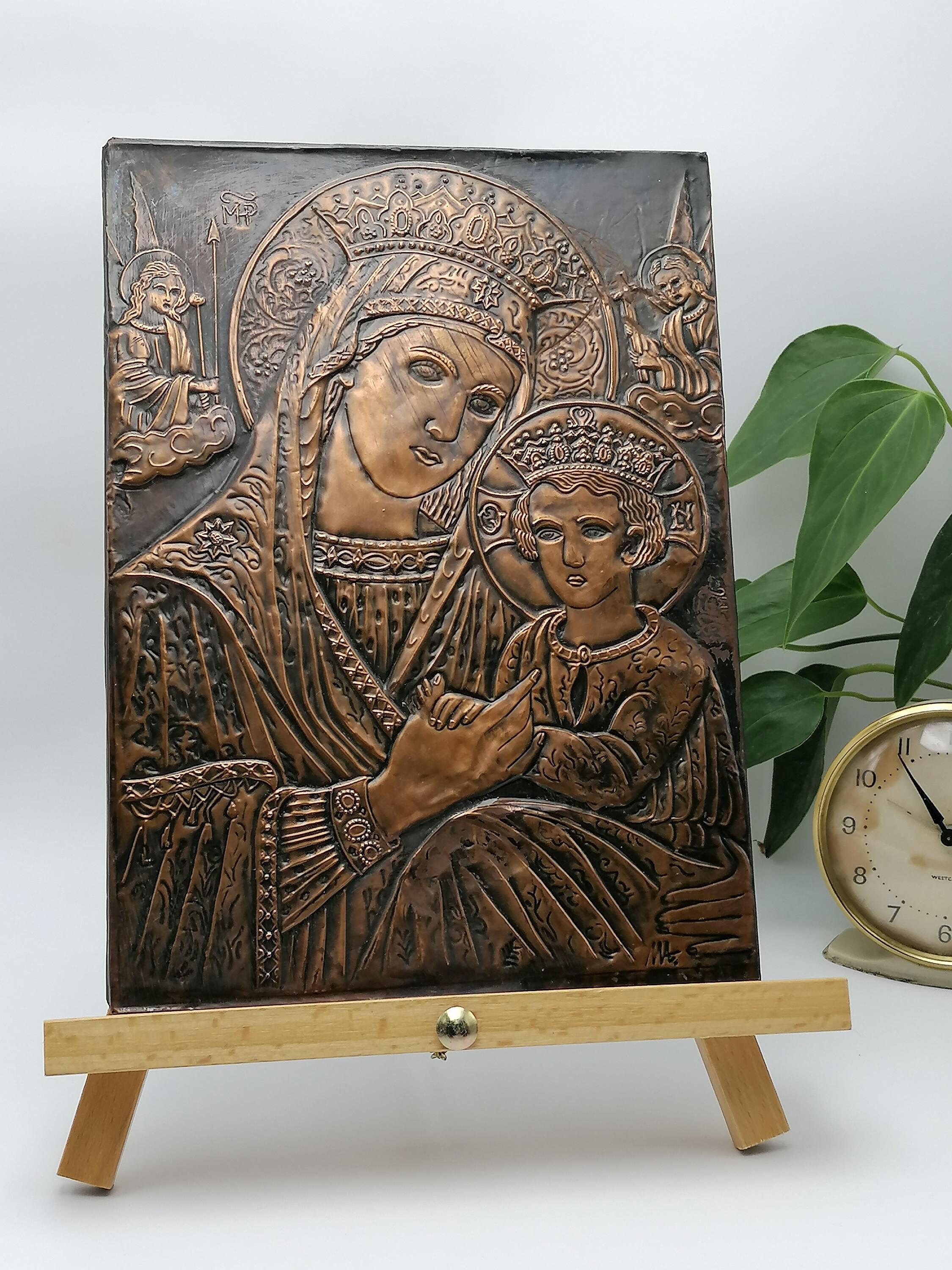 Vintage repoussé metal icon Madonna and Child, worn board backed wall hanging. Religious art