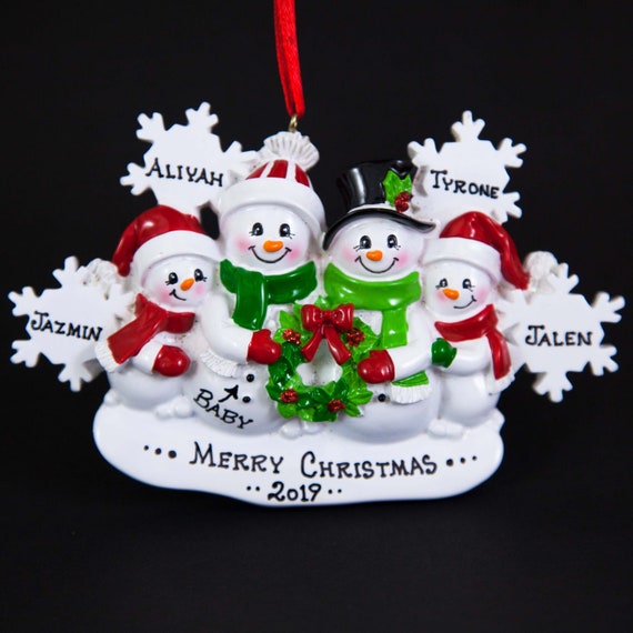 family ornaments with pregnant mom