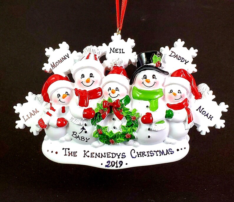 family christmas ornament with pregnant mom