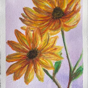May include: Two yellow sunflowers with orange and red hues are painted on a light purple background. The sunflowers have dark brown centers and are drawn with long, thin strokes.