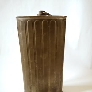 Vintage hot water bottle warmer bed material canister metal cap accessory supply bedding 1900s France collectible object bottle