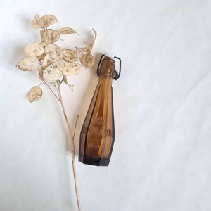 Vintage amber glass bottle/tilt stopper/metal and porcelain/hexagonal shape/bar brasserie/French retro France/Bock Montplaisir 23cl