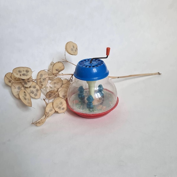 Vintage boite musique tourniquet manivelle personnage Schtroumpfs dessin animé jouet jeux Allemagne figurine plastique ancien bleu rouge