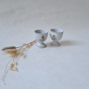 Vintage egg cups set 2/ceramic porcelain white color gold edging/girl cat flower pattern/egg table art service/old retro flea market French